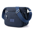 Bolsa Compacta em Nylon Resistente à Água e Fechamento em Zíper Bolsa Compacta em Nylon Resistente à Água e Fechamento em Zíper Importe Go Azul Marinho 