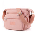 Bolsa Compacta em Nylon Resistente à Água e Fechamento em Zíper Bolsa Compacta em Nylon Resistente à Água e Fechamento em Zíper Importe Go Rosa 